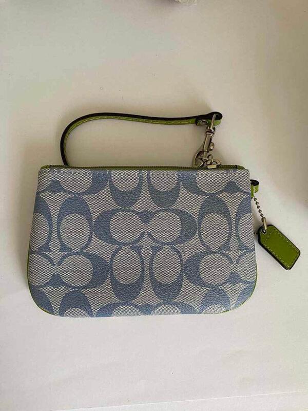 coach signature wristlet blue and green